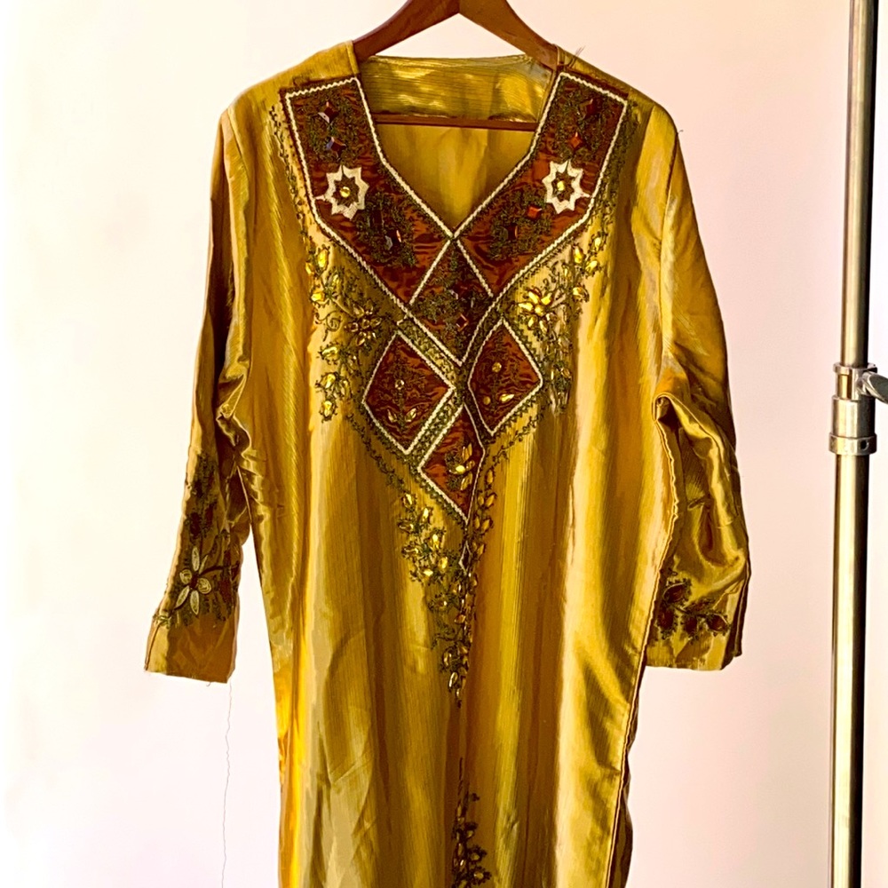 Beautiful golden dress from Middle East
